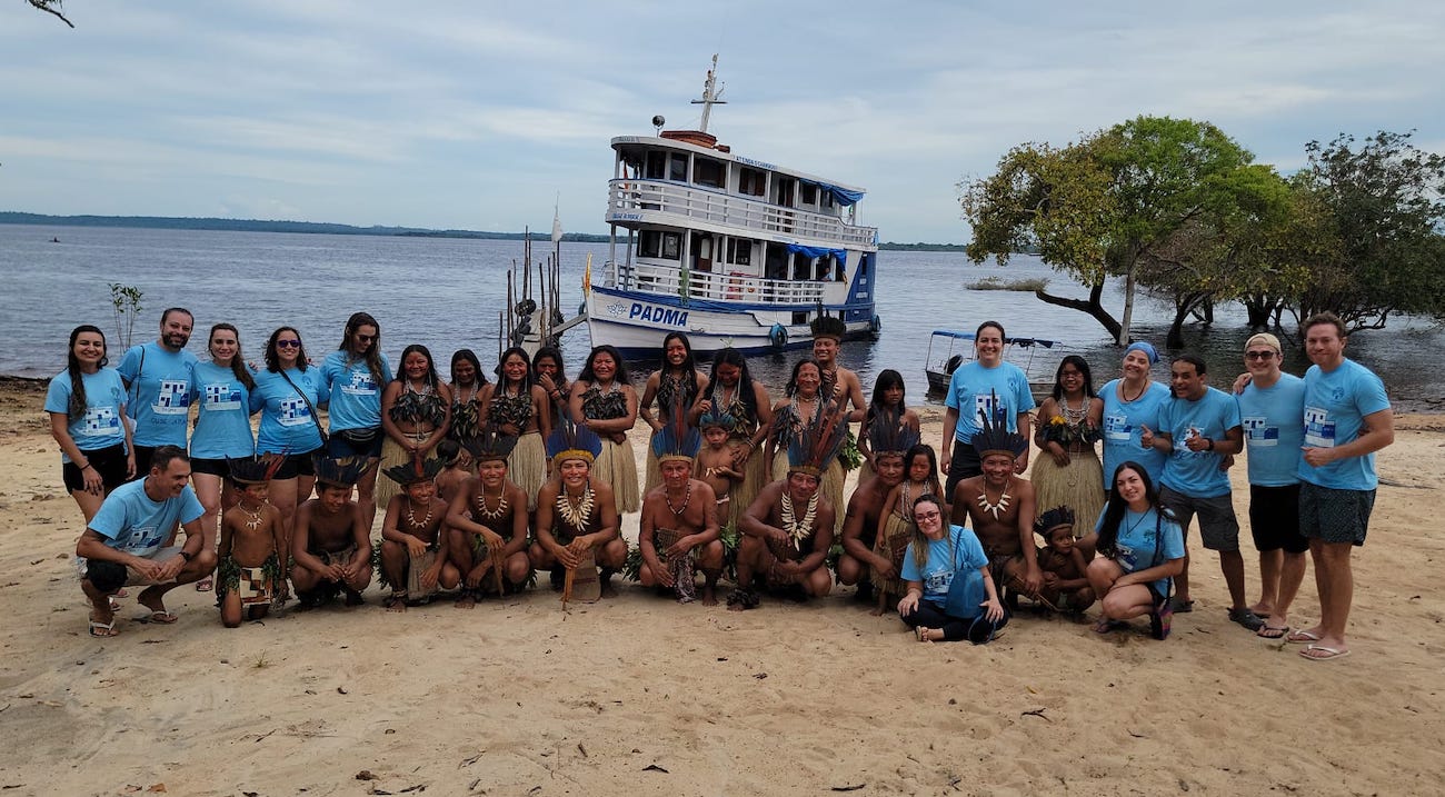 A young patient receiving a dental checkup along the Amazon River